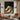 Abstract Black and Gold Textured Oil Painting with Flowing Wave Patterns
