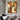 Abstract geometric oil painting with angular white shapes contrasting against rich brown textures, visible brushstrokes on linen canvas, modern earth tone artwork.?