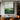 Abstract oil painting of green landscape with golden textured accents and natural earth tones.