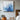 Minimalist abstract painting in layered icy blue and white tones with thick paint texture