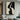 Abstract minimalist painting of intertwined female faces in black and beige