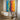 Abstract Urban Canvas Art with Rainbow Street and Minimalist Umbrella Figures