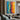 Abstract Urban Canvas Art with Rainbow Street and Minimalist Umbrella Figures
