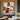 abstract minimalist painting of a woman seated in earth tones and white
