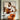 abstract minimalist painting of a woman seated in earth tones and white