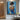 Hand-painted oil painting of woman in blue dress from behind, impressionist canvas wall art with textured palette knife technique