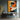 "Chromatic Muse" abstract portrait painting of a face in profile using bold blocks of orange, blue, black, and white with red lips, in a modern graphic style.