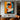 "Chromatic Muse" abstract portrait painting of a face in profile using bold blocks of orange, blue, black, and white with red lips, in a modern graphic style.