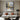 Metallic abstract cityscape painting with golden lights and water reflections