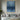 "Deep Water Horizon" abstract oil painting depicting a dark blue water surface meeting a foggy, atmospheric horizon in shades of grey and light blue, creating a moody and serene seascape.