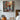Colorful still life oil painting of poppies in vase with sunlight through window
