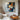 Geometric abstract oil painting with textured blocks in blue, orange, and beige tones