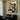 Modern abstract geometric artwork with stylized profile in warm earth tones