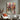 Abstract Black Female Silhouettes Walking in Pink and Red Urban Backdrop on Canvas