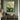 "Pale Lily Pond" abstract oil painting depicting delicate light green and white water lilies or lotus flowers with soft, expressive brushstrokes in a contemporary floral art style.