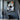 Abstract hand-painted portrait of two women with closed eyes in muted tones, symmetrical and geometric style