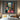hand-painted fauvist oil painting of colorful home interior in Henri Matisse style with pink floor, oranges, and teal walls