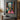 hand-painted fauvist oil painting of colorful home interior in Henri Matisse style with pink floor, oranges, and teal walls