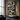 "Urban Fragments" abstract oil painting in black, white, and grey, featuring a complex composition of geometric shapes, bold calligraphic lines, and textured areas.