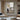 Minimalist abstract painting with a lone figure in a soft gray and beige city scene
