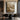 abstract textured canvas in beige tones with flowing wave-like brushwork