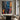 Abstract oil painting with explosive color splashes in white, blue, orange, and pink intersecting on black textured canvas.  