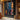 Abstract oil painting with explosive color splashes in white, blue, orange, and pink intersecting on black textured canvas.  