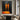 Abstract oil painting of two glowing orange human silhouettes standing vertically against a dark charcoal background with mirrored reflections.