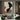 Abstract oil painting of a black female profile with orange and grey curved shapes, textured ivory background, and minimalist composition.  
