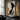 Abstract oil painting of a black female profile with orange and grey curved shapes, textured ivory background, and minimalist composition.  
