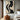 Abstract handmade oil painting with black curves and red lips showing a female profile