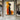 Minimalist Abstract Female Silhouette Painting Within the Light in Orange and Black