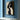 Abstract minimalist painting of intertwined female faces in black and beige