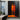 Abstract orange and black oil painting of two figures side by side