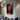 Abstract orange and black oil painting of two figures side by side