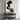 Abstract oil painting of a human profile with fluid black and white overlapping shapes on a light beige textured background.