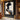 Abstract oil painting of a human profile with fluid black and white overlapping shapes on a light beige textured background.