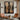 Abstract oil painting of symmetrical hourglass forms with woodgrain textures in beige and brown tones, transitioning to black gradient background.  
