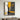 "Amber & Ash Bloom" abstract oil painting of a stylized tree with a black trunk and vibrant yellow textured foliage, set against a textured background of greys and whites with black and yellow drips.
