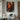Abstract oil painting of a human figure in black silhouette with fiery orange brushstrokes