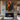 Abstract oil painting of a human figure in black silhouette with fiery orange brushstrokes