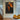 Abstract silhouette oil painting of woman in black with fiery orange background, expressive emotional hand-painted canvas wall art