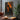 Abstract silhouette oil painting of woman in black with fiery orange background, expressive emotional hand-painted canvas wall art