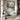 Metallic abstract cityscape painting with golden lights and water reflections