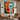 "Dual Essence" abstract portrait oil painting of a fragmented face with one open and one closed eye, using bold blocks of orange, blue, black, and white with red lips.
