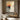 "Earthen Divide" textured abstract oil painting showcasing a minimalist composition of layered neutral tones (beige, grey, cream) with a prominent dark brown/black horizontal band.
