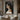 Minimalist Female Portrait Painting in Black and Earth Tones Vertical Composition