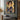 "Floral Tapestry Maiden" oil painting of a woman with flowers in her dark hair, wearing an intricately patterned blue dress, against a vibrant yellow background with floral and bird designs.
