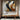 Abstract geometric oil painting with flowing golden, black and beige wave-like forms