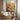 abstract canvas painting with soft sand-toned waves and golden flowing texture